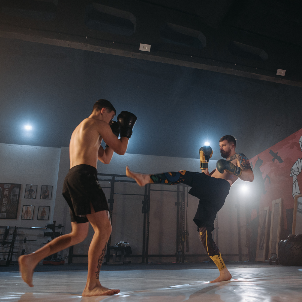 A Sentry Jiu-Jitsu striking & combatives class training boxing and kickboxing on the mats